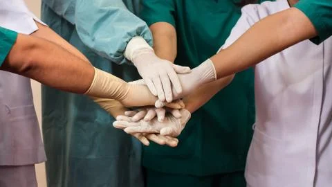 Doctors and nurses coordinate hands. Concept Teamwork Stock Photos