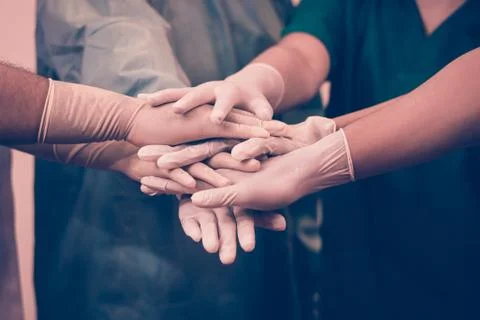 Doctors and nurses coordinate hands. Concept Teamwork Stock Photos