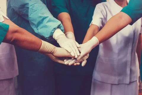 Doctors and nurses coordinate hands. Concept Teamwork Stock Photos