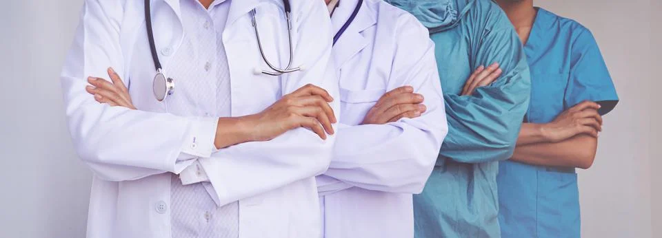 Doctors and Nurses coordinate hands. Concept Teamwork Stock Photos