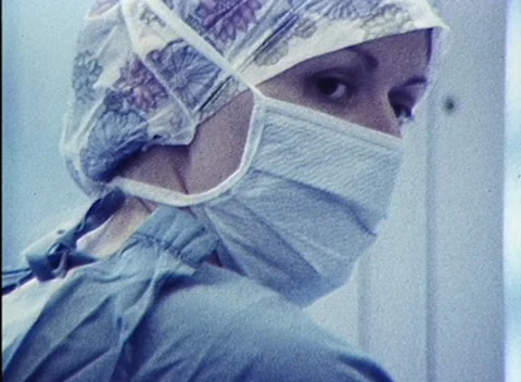 DOCTORS AND NURSES IN OPERATING THEATRE (1981) Stock Footage 162292668