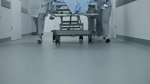 Doctors and nurses push stretcher with p... | Stock Video | Pond5