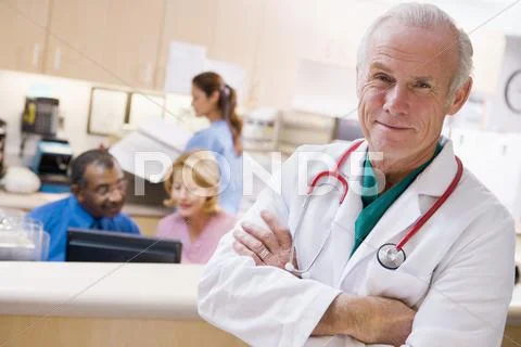 Doctors And Nurses At The Reception Area Of A Hospital ~ Hi Res #21644693