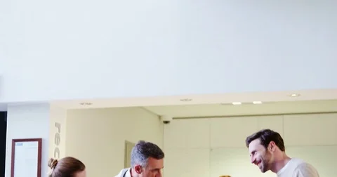 Doctors and patient interacting with each other Stock Footage 72823168