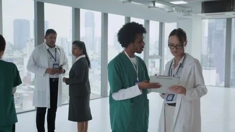 Doctors and Staff Collaborating in Moder... | Stock Video | Pond5