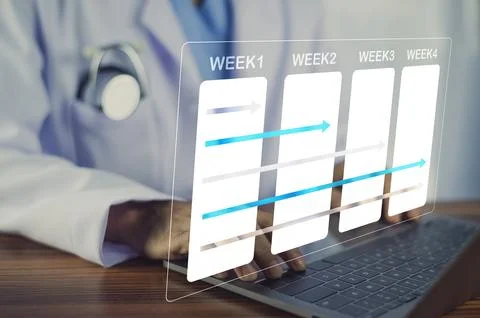 Doctors are using calendars to schedule treatment plans for patients and ma.. Foto stock
