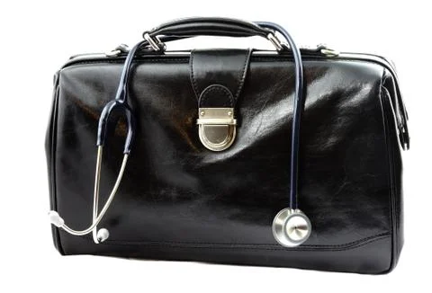 Doctor's bag with stethoscope Stock Photos