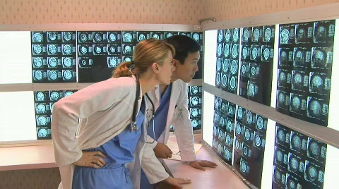 Doctors consulting Stock Footage