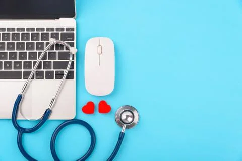 Doctor's Day concept, flat lay top view, stethoscope with laptop computer dia Stock Photos