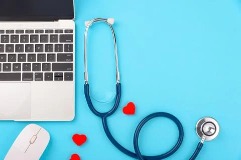 Doctor's Day concept, flat lay top view, stethoscope with laptop computer dia Stock Photos