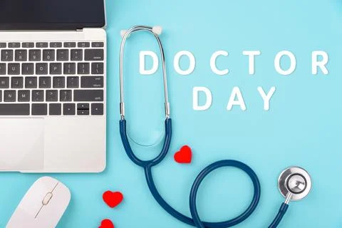 Doctor's Day concept, flat lay top view, stethoscope with laptop computer Stock Photos