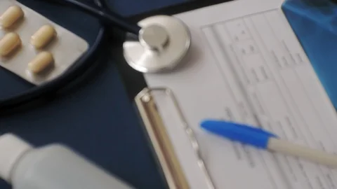 Doctor's desk, top view on blue background, medicine concept Stock-Footage 107082668