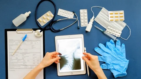 Doctor's desk, top view on blue background, medicine concept Stock Footage 107085411