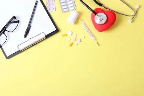 Doctor's desk top view. Set of different doctor accessories. Stock-Fotos