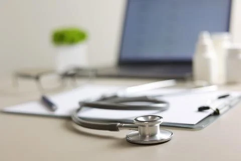 Doctor's desk top view. Set of different doctor accessories on a colored Stock Photos