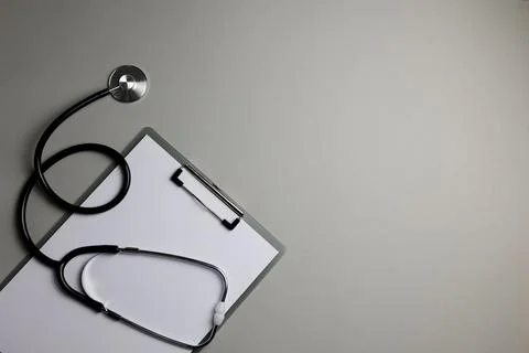 Doctor's desk top view. Set of different doctor accessories on a colored Foto stock