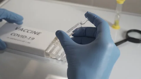 Doctors developing a vaccine for the coronavirus. Stock Footage 146031252