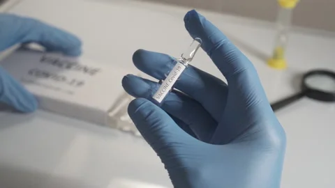 Doctors developing a vaccine for the coronavirus. Stock Footage 146036353