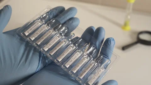 Doctors developing a vaccine for the coronavirus. Stock Footage 146037479