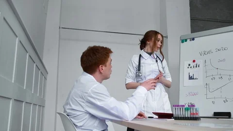 Doctors discuss the increase in the level of human infection with coronavirus Stock Footage 127513501