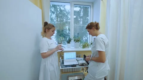 Doctors discuss a treatment plan Stock Footage 233559869