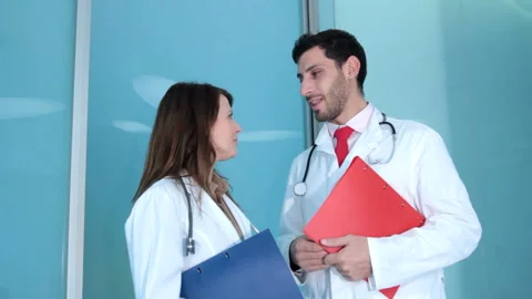 Doctors Discussing And Smile Stock-Footage 210668337