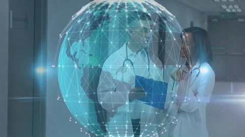 Doctors discussing notes in hospital corridor, featuring digital globe network Stock Footage 307974139