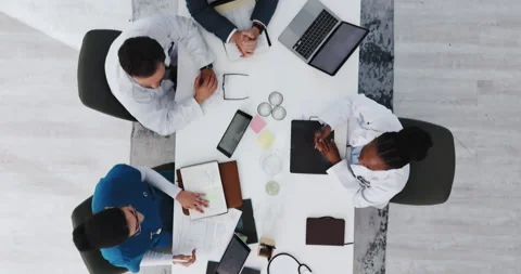 Doctors, discussion and people with tech, boardroom and budget for new medical Stock Footage 321327235