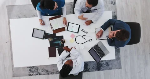 Doctors, discussion and people with tech, hospital and budget for new medical Stock Footage 321327392
