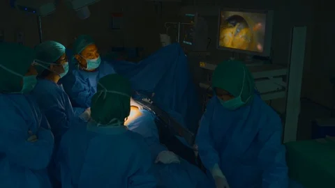Doctors doing surgery Stock Footage 105820449