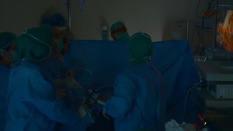 Doctors doing surgery Stock Footage 105820504
