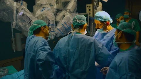 Doctors doing surgery Stock Footage 105820576