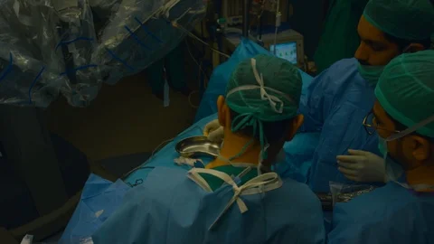 Doctors doing surgery Stock Footage 105821077