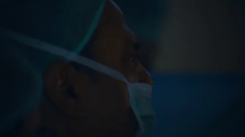 Doctors doing surgery Stock Footage 105822483