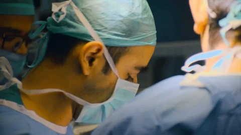 Doctors doing surgery Stock Footage 105823113