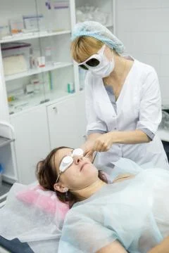 Doctors doing vein surgery procedure Stock Photos