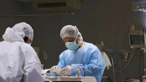 Doctors Examine Blood Test Vials Video stock 133380440