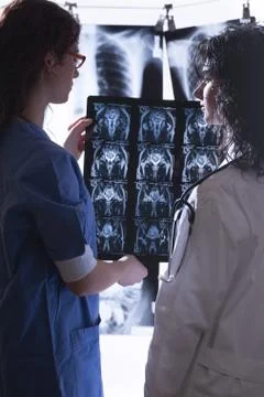Doctors examine x-rays Stock Photos