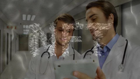 Doctors examining tablet in hospital corridor, showing digital wave pattern for Stock Footage 309103129