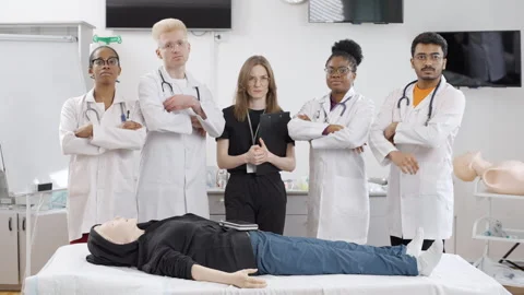 Doctors at a first aid course looking at camera Video stock 270167613