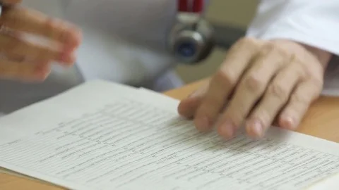 Doctor's hand Stock Footage 83555273