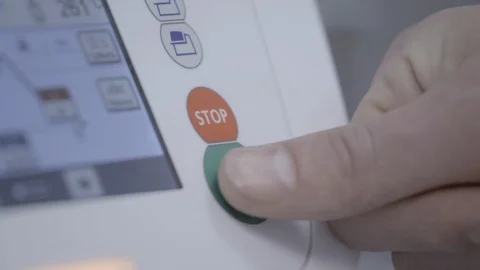 Doctors hand pressing start button on the machine at the hospital Stock Footage 106943517