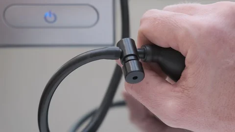 Doctors hand pumping air with a ball to measure patients blood pressure. Stock Footage 104975133
