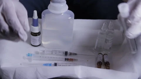 Doctor's Hands Adding A Reagent To A Test Tube, Laboratory, Research, Clinic Stock Footage 46001187