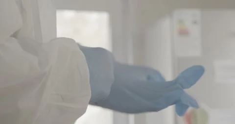 Doctor's hands in blue gloves Stock Footage 287987671