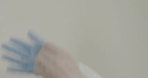 Doctor's hands in blue gloves Stock Footage 287988028