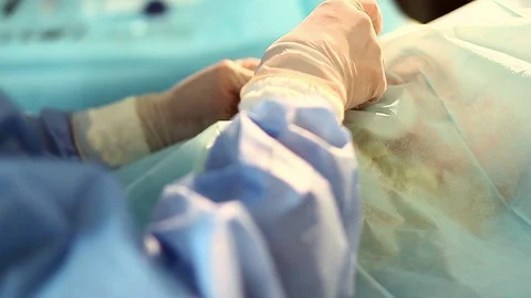 Doctor's hands during surgery Stock Footage 97996439