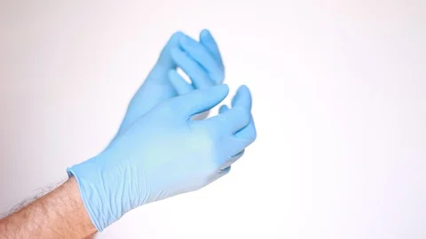 Doctor's hands in gloves gesticulating Vídeos de archivo 96239857