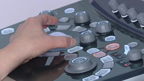 Doctor's hands on ultrasound device Video stock 111244599