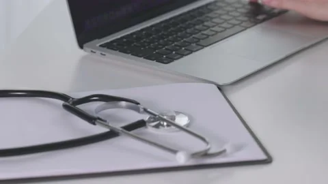 Doctor's hands using laptop in hospital clinic office, medical physician working Video stock 206185586